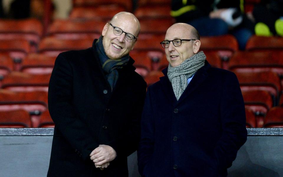 Joel Glazer (right) is thought to be against selling wantaway Cristiano Ronaldo - PA