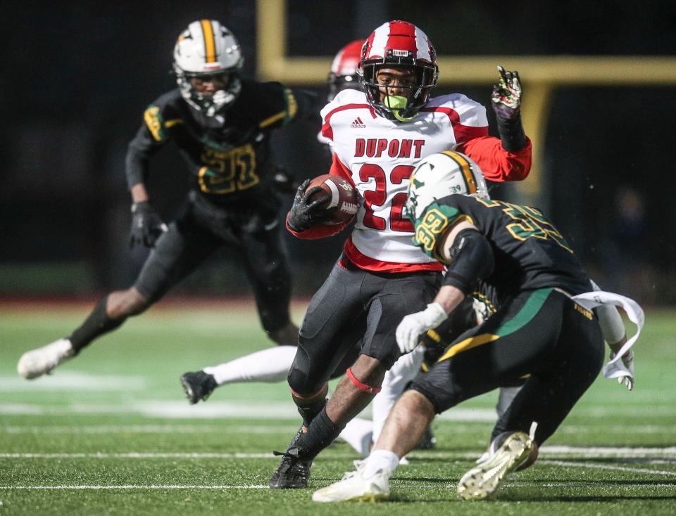 Manual's ZahRon Washburn runs for yardage against St. X on Oct. 7, 2022.