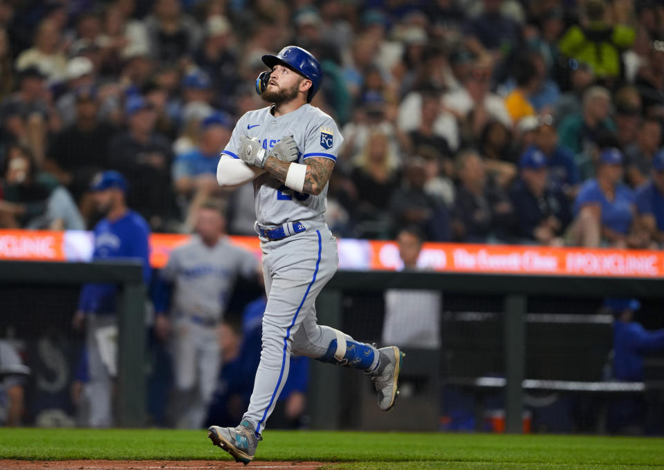 Kansas City Royals' Kyle Isbel gestures as he jogs home with a two-run home run against the Seattle Mariners during the seventh inning of a baseball game Friday, Aug. 25, 2023, in Seattle. (AP Photo/Lindsey Wasson)