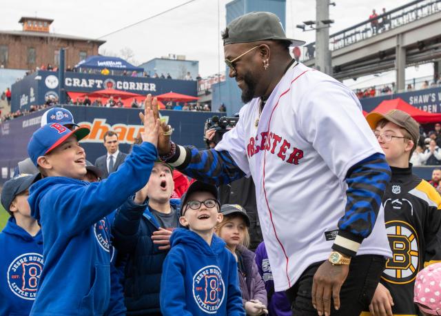 Big Papi teams up with North High champs for first pitch at WooSox opener