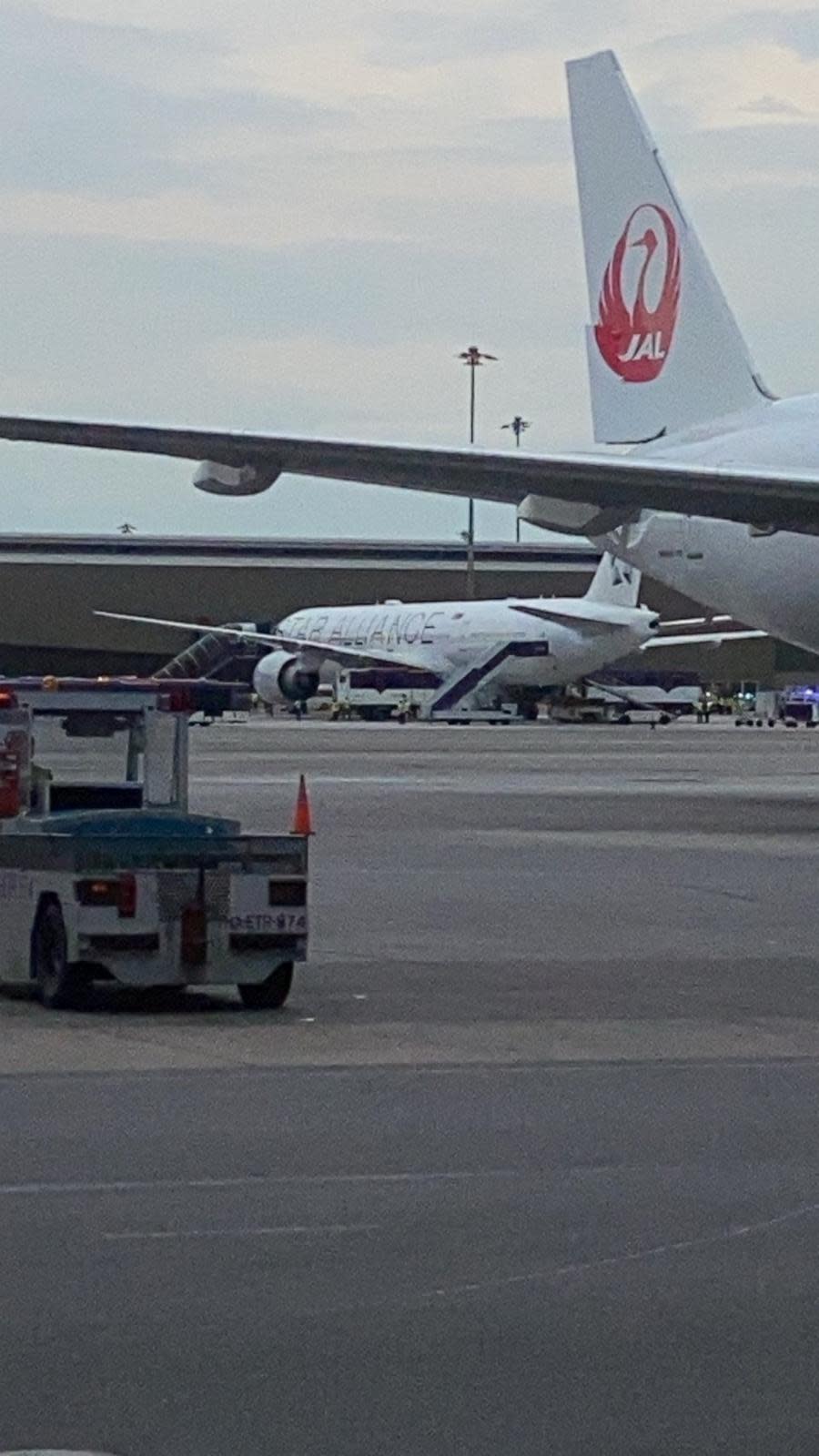PHOTO: A Singapore airline aircraft is seen on tarmac after requesting an emergency landing at Bangkok's Suvarnabhumi International Airport, Thailand, May 21, 2024. (Pongsak Suksi via Reuters)