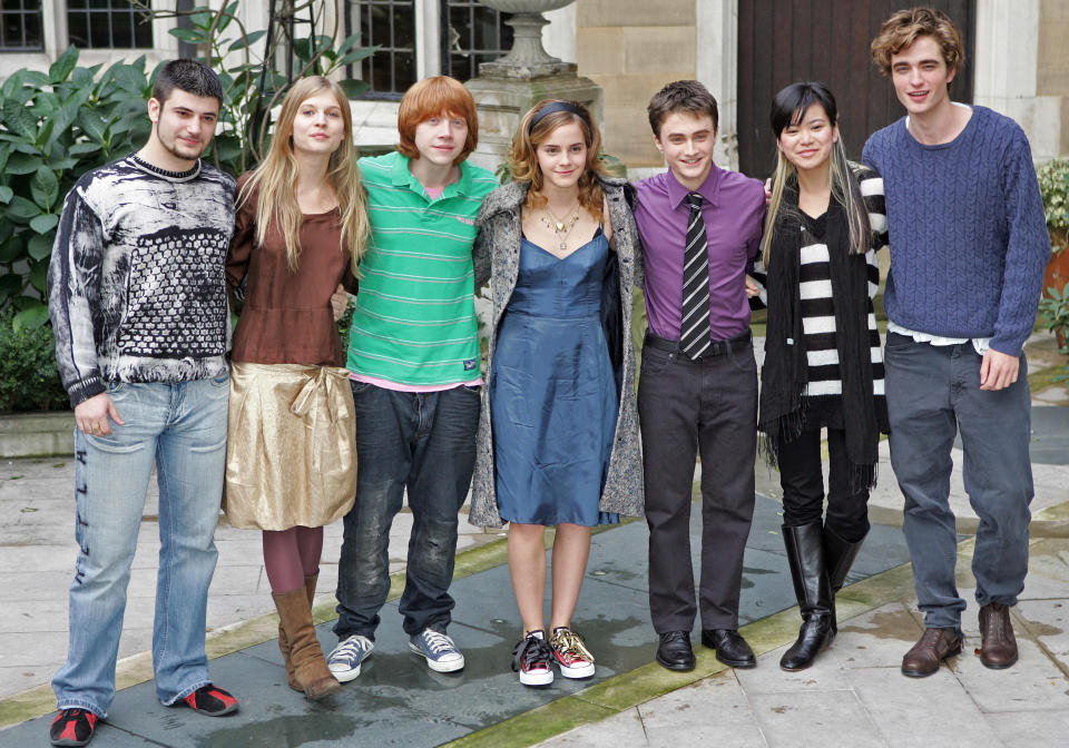 British actors (L to R) Stanislav Ianevski who plays Viktor Krum, Clemence Poesy who plays Fleur Delacour, Rupert Grint who plays Ron Weasley, Emma Watson who plays Hermione Granger, Daniel Radcliffe who plays Harry Potter, Katie Leung who plays Cho Chang and Robert Pattinson who plays Cedric Diggory in the forthcoming film "Harry Potter and the Goblet of Fire" attend a photocall in London October 25, 2005. The film which is the fourth in the series of Harry Potter films based on the books by British author JK Rowling will premiere in London on November 6. REUTERS/Toby Melville