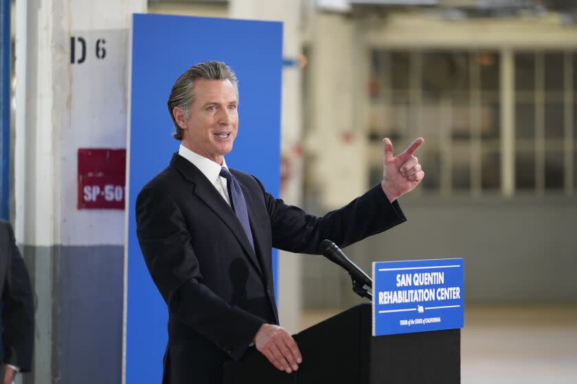 California Gov. Gavin Newsom speaks inside a warehouse at San Quentin State Prison in San Quentin, Calif., Friday 3/17/23.