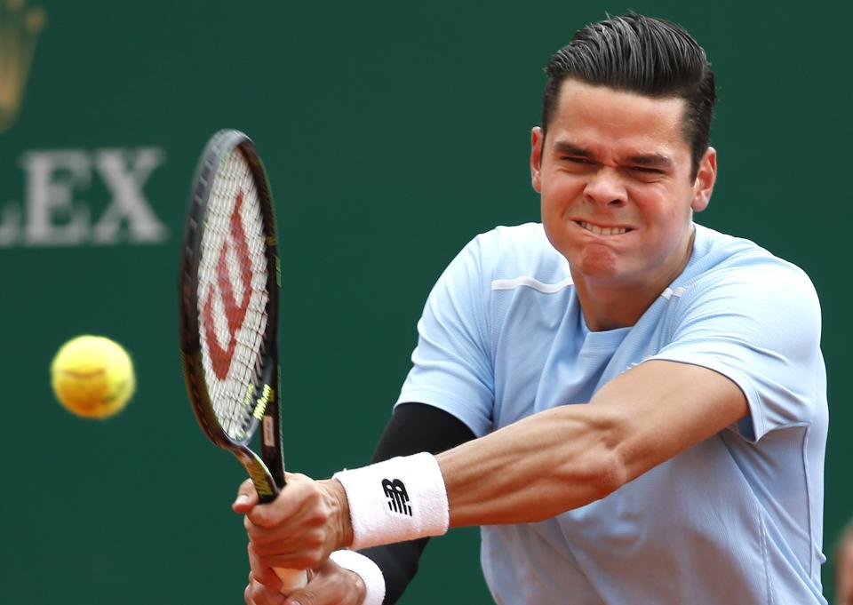 Milos Raonic of Canada returns the ball to Tomas Berdych of the Czech Republic during their quarter-final match at the Monte Carlo Masters in Monaco April 17, 2015. REUTERS/Eric Gaillard