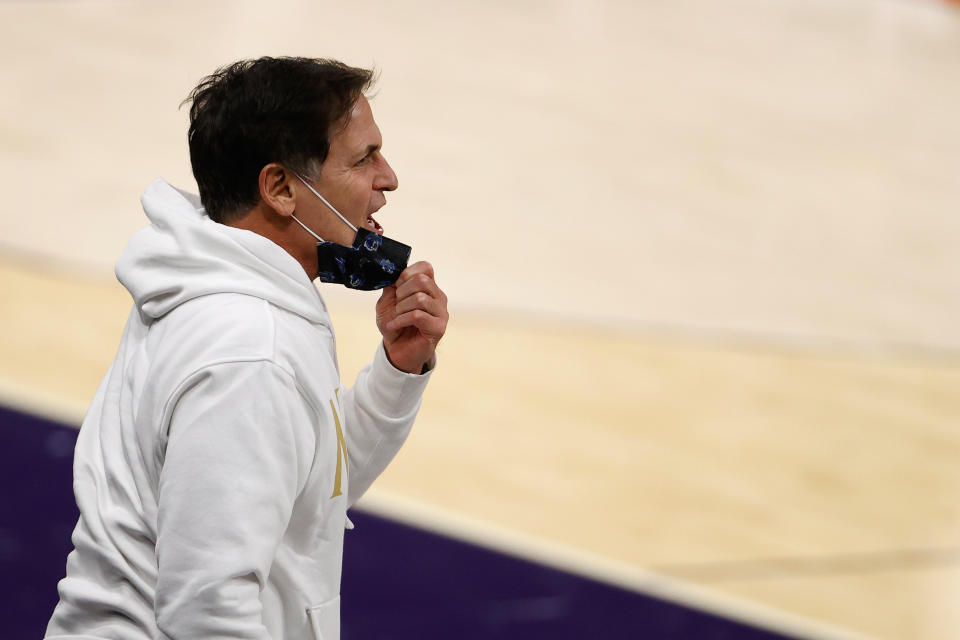 PHOENIX, ARIZONA - DECEMBER 23: Dallas Mavericks owner, Mark Cuban reacts to players during the NBA game against the Phoenix Suns at PHX Arena on December 23, 2020 in Phoenix, Arizona.  NOTE TO USER: User expressly acknowledges and agrees that, by downloading and/or using this Photograph, user is consenting to the terms and conditions of the Getty Images License Agreement. Mandatory Copyright Notice: Copyright 2020 NBAE (Photo by Christian Petersen/Getty Images)