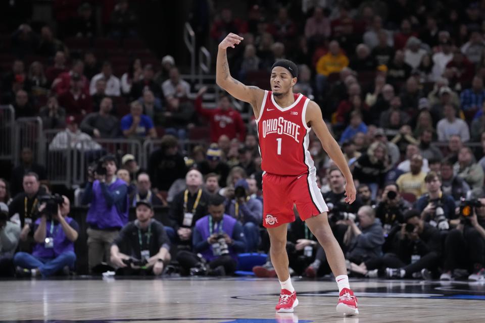 Ohio State's Roddy Gayle Jr. reacts after hitting a 3-point shot during the first half of an NCAA semifinal basketball game against the Purdue at the Big Ten men's tournament, Saturday, March 11, 2023, in Chicago. (AP Photo/Charles Rex Arbogast)