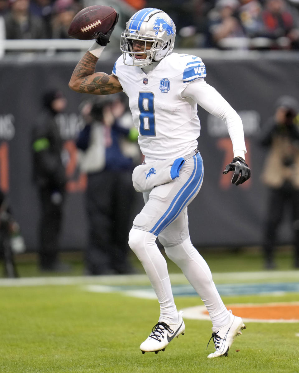 Detroit Lions wide receiver Josh Reynolds begins to celebrate his touchdown reception from quarterback Jared Goff during the first half of an NFL football game against the Chicago Bears Sunday, Dec. 10, 2023, in Chicago. (AP Photo/Erin Hooley)