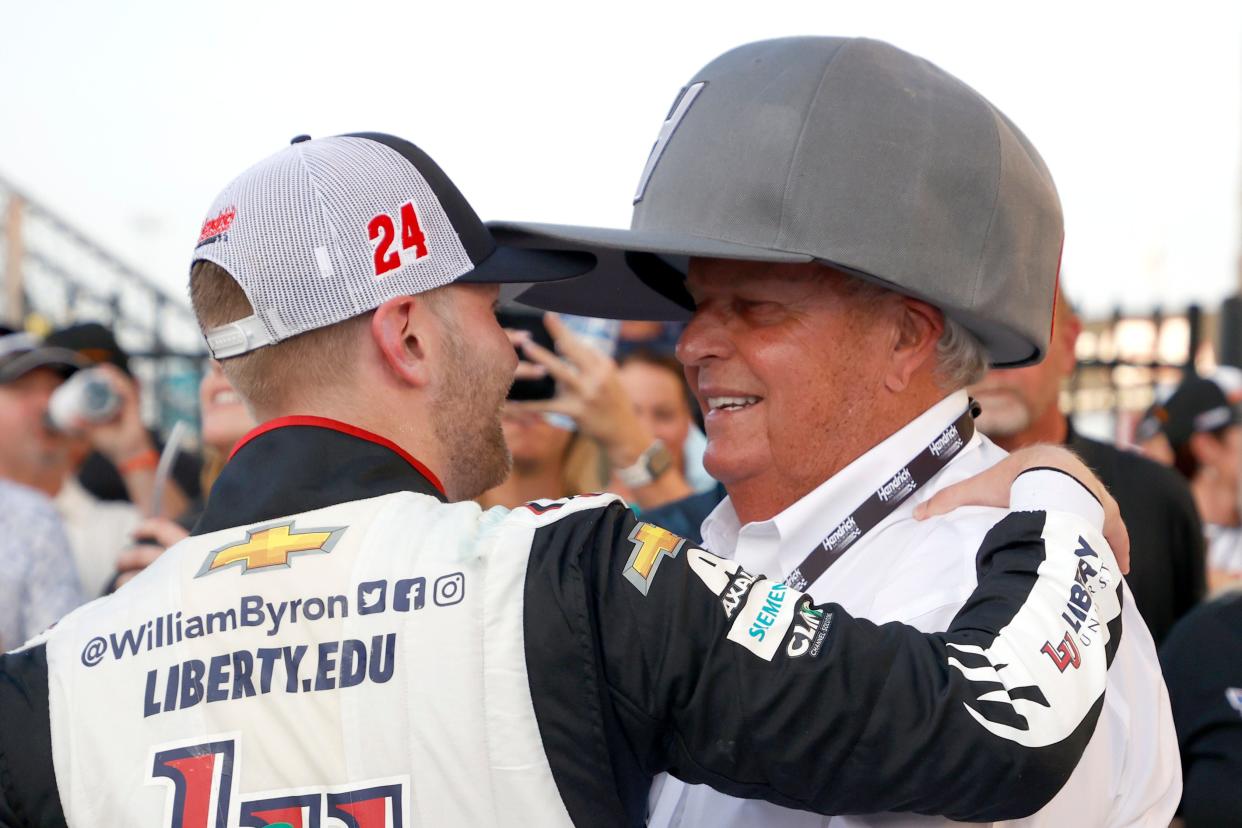 William Byron (left) gave Hendrick Motorsports team owner Rick Hendrick (right) his 300th NASCAR Cup Series win. And a big hat.