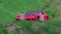 <p>The opening scene from The Italian Job is arguably just as memorable as its Mini Cooper chase scene. It also has <a href="https://www.roadandtrack.com/car-culture/entertainment/a27391926/1969-lamborghini-miura-italian-job-found/" rel="nofollow noopener" target="_blank" data-ylk="slk:an interesting backstory;elm:context_link;itc:0;sec:content-canvas" class="link ">an interesting backstory</a>: Lamborghini actually provided a previously-crashed Miura so the filmmakers wouldn't crash one of their cars. Good on them. </p>