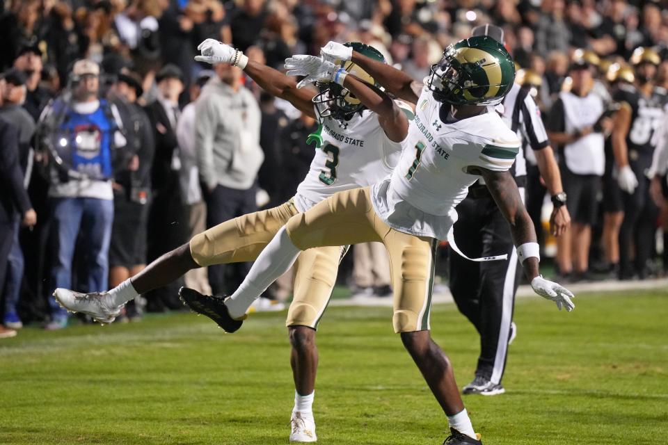 Sep 16, 2023; Boulder, Colorado, USA; Colorado State Rams defensive back Ron Hardge III (3) celebrates with defensive back Chigozie Anusiem (1) after recovering a fumble for a touchdown against the Colorado Buffaloes during the first half at Folsom Field. Mandatory Credit: Andrew Wevers-USA TODAY Sports