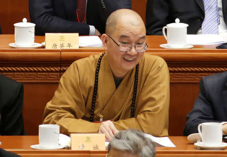 Xuecheng, the delegate of the Chinese People's Political Consultative Conference (CPPCC) and the abbot of the Longquan Temple, attends an opening session of the CPPCC at the Great Hall of the People in Beijing, China March 3, 2016. REUTERS/Jason Lee/Files