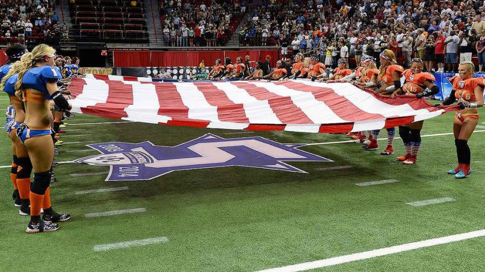 LFL players saluting the flag. Pic: Getty