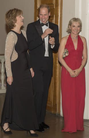 <p>ARTHUR EDWARDS/AFP via Getty</p> Ann Chalmers, Prince William and Julia Samuel at a charity dinner marking 21st anniversary of Child Bereavement UK in London on October 15, 2015.