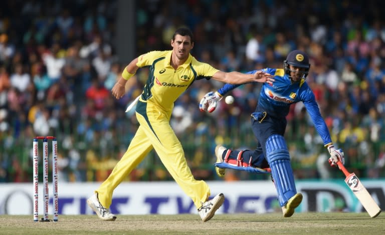 Australian cricketer Mitchell Starc stops a ball in Colombo on August 21, 2016