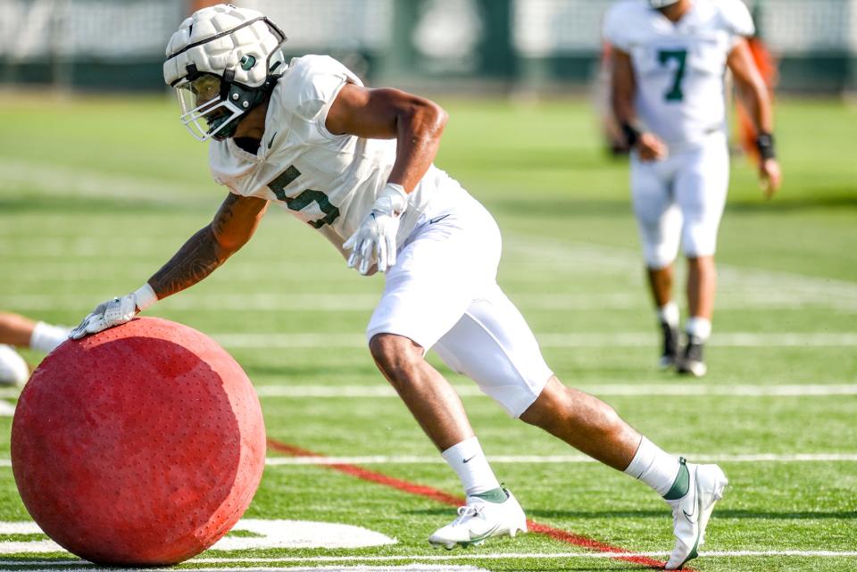 Michigan State linebacker Jordan Hall runs a drill during football practice on Wednesday, Aug. 9, 2023, in East Lansing.
