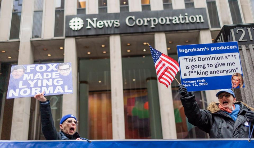 Protesters demonstrate outside Fox News headquarters in New York on 28 Februrary. (EPA)