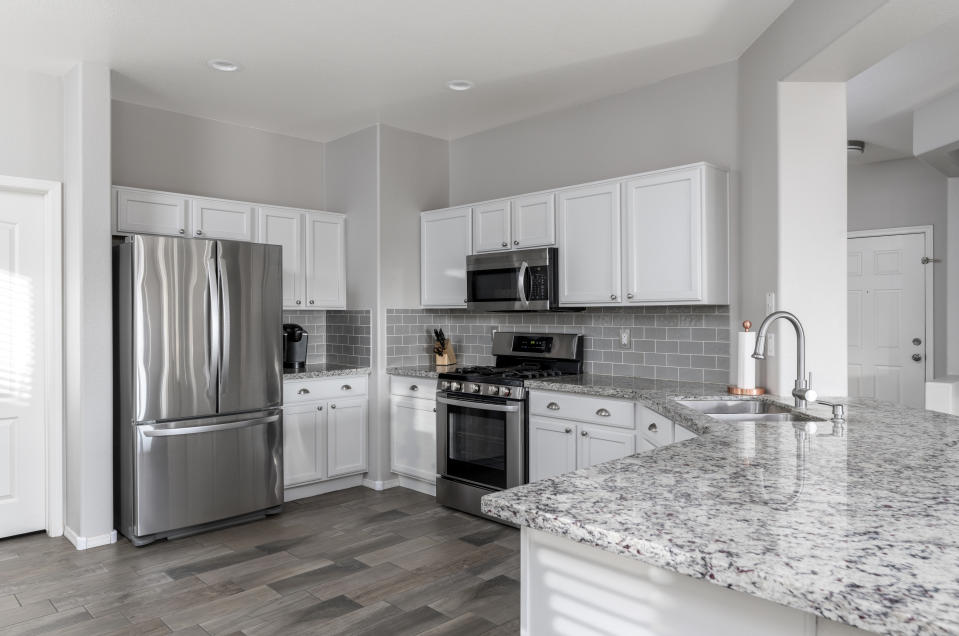 Color photo of a beautiful modern kitchen.