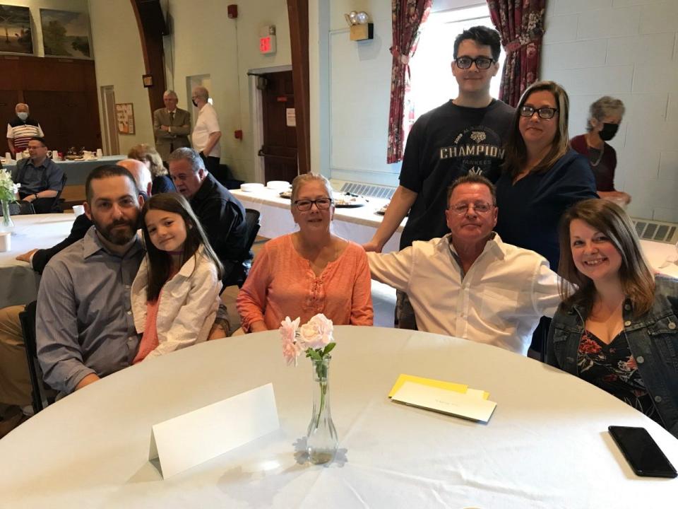 Guy Kostka, seated second from left,  with his family at the Old Paramus Reformed Church reception on June 12 honoring his retirement . Standing are grandson Christopher Jeffers and daughter Barbara DiPietro. Seated, from left, are Justin DiPietro, daughter Skylar, wife Jane Kostka, Guy Kostka and his daughter, Amy.