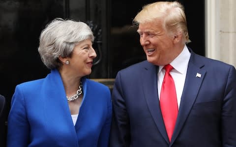 British Prime Minister Theresa May and US President Donald Trump arrive at 10 Downing street for a meeting - Credit: Dan Kitwood/Getty