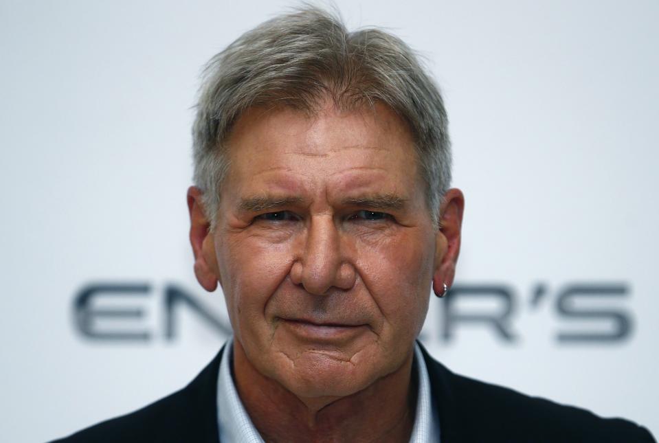 Actor Harrison Ford poses for photographers at a question and answer event about his new film "Enders Game" at a cinema at Leicester Square in central London in this October 7, 2013 file photo. Actor Harrison Ford was injured on March 5, 2015 in the crash of a small airplane outside Los Angeles, celebrity website TMZ reported. REUTERS/Andrew Winning (BRITAIN - Tags: ENTERTAINMENT HEADSHOT TRANSPORT DISASTER)