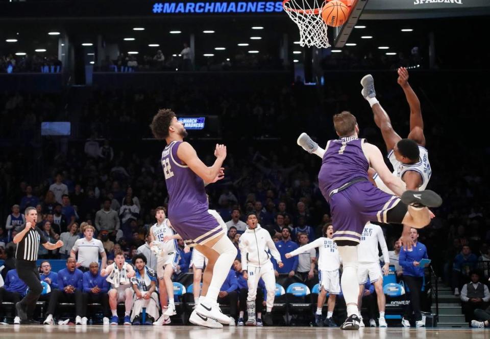 Duke’s Jaylen Blakes (2) goes down hard after being fouled by James Madison’s Noah Freidel (1) during Duke’s 93-55 victory over James Madison in the second round of the NCAA Tournament at the Barclays Center in Brooklyn, N.Y., Sunday, March 24, 2024. Ethan Hyman/ehyman@newsobserver.com