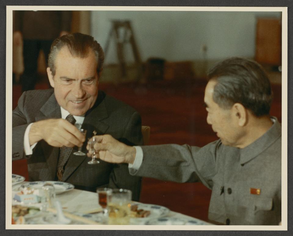 This photograph was taken on February 21, 1972, on the first day of President Richard M. Nixon's visit to the People's Republic of China. He raises a toast with Enlai Zhou, who was the first premier of the People's Republic of China.