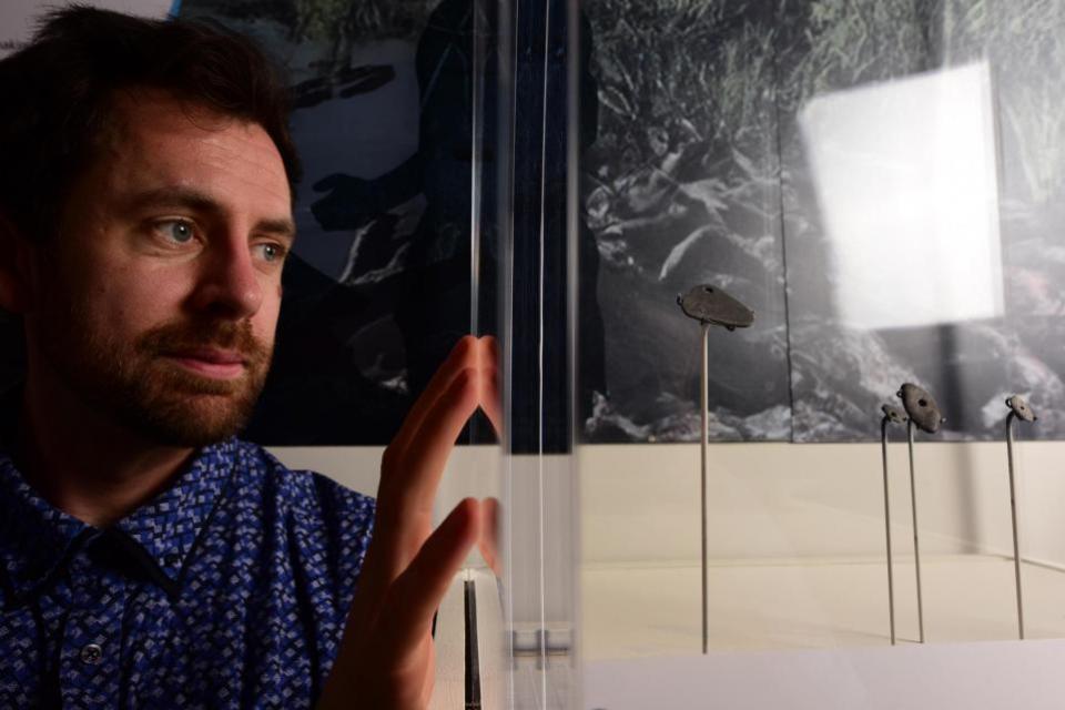 York Press: Curator Adam Parker with Star Carr pendants at the Yorkshire Museum