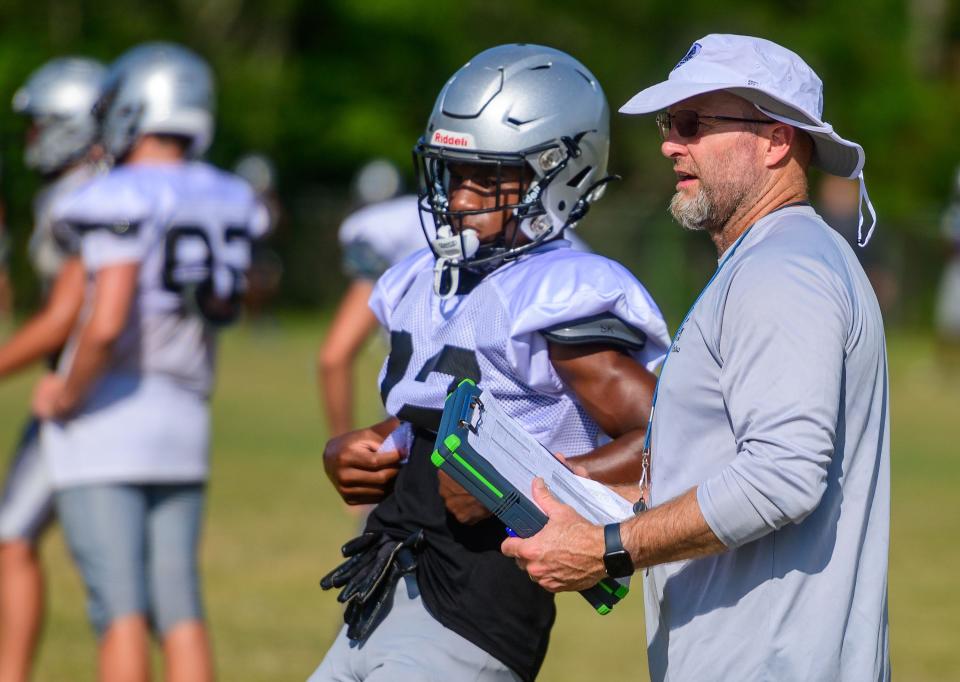 Despite stepping down as head football coach, Darrell Sutherland will remain a teacher at Bartram Trail High School.