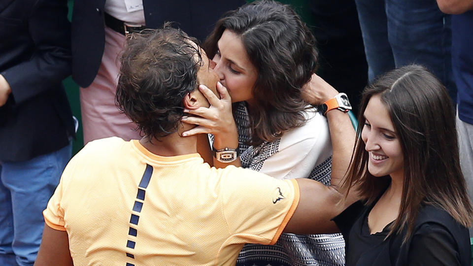 Rafael Nadal kisses his girlfriend Xisca Perello in 2016. (Image: VALERY HACHE/AFP/Getty Images)