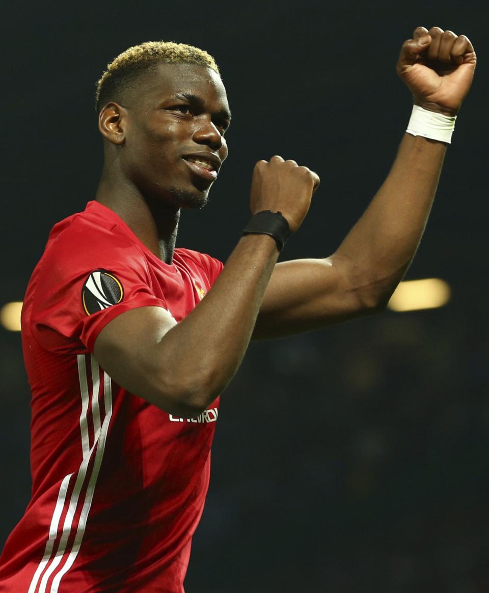 <p>Manchester United’s Paul Pogba celebrates after the end of the Europa League semifinal second leg soccer match between Manchester United and Celta Vigo at Old Trafford </p>