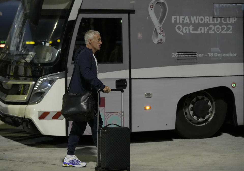 France's national team coach Didier Deschamps arrives with his team at Hamad International airport in Doha, Qatar, Wednesday, Nov. 16, 2022, ahead of the upcoming World Cup. France will play their first match in the World Cup against Australia on Nov. 22. (AP Photo/Hassan Ammar)