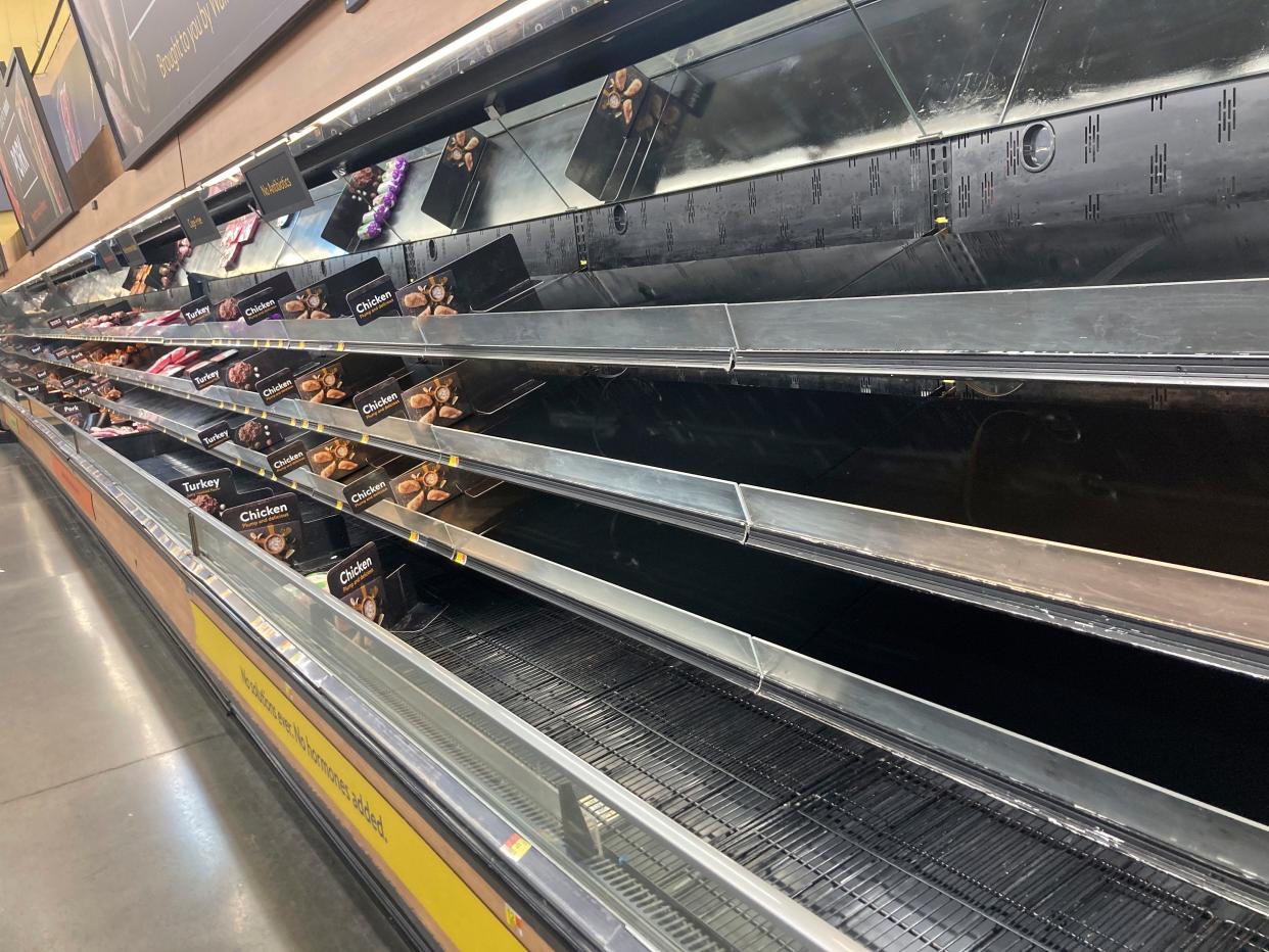 Shelves sit empty at a Walmart in Anchorage, Alaska, on Jan. 8, 2022. Shortages at U.S. grocery stores have grown in recent weeks.