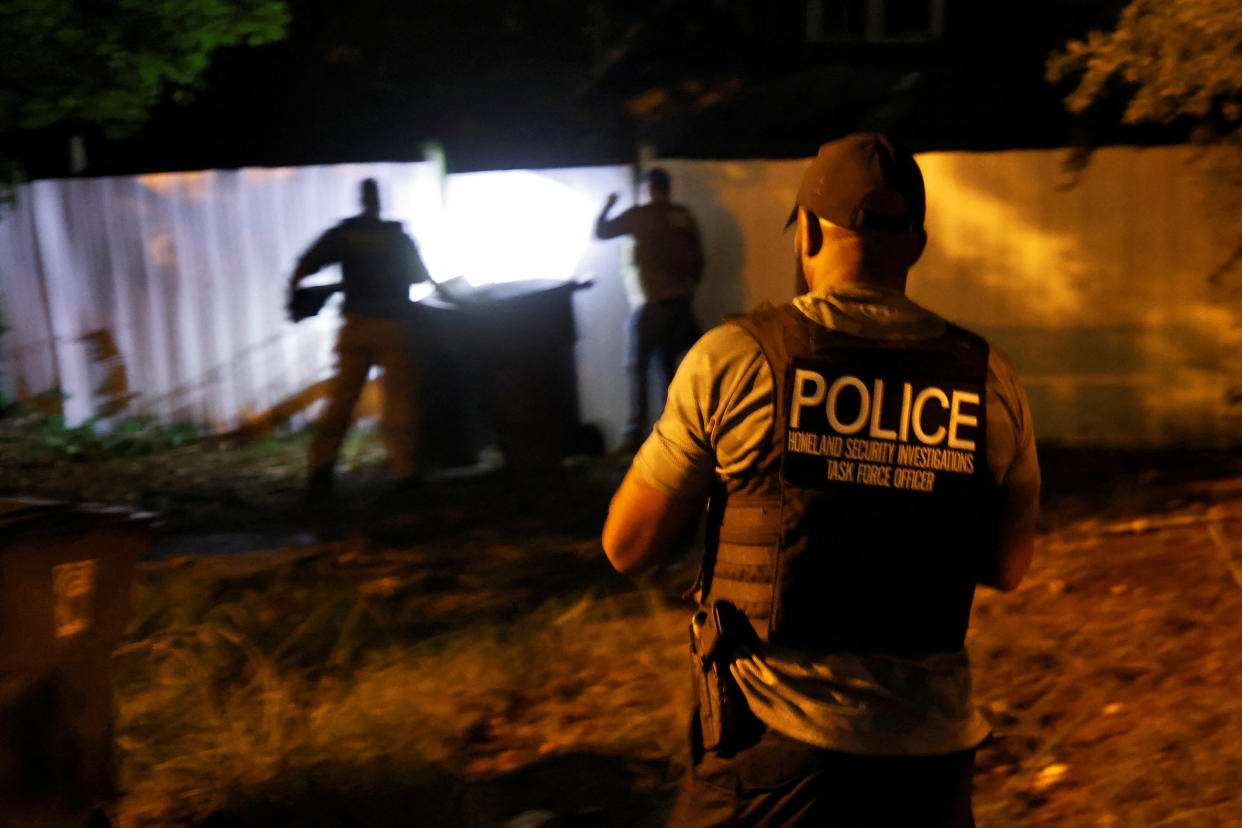 Secret Service and Homeland Security agents check a former home of a suspect named by news organizations as Ryan W. Routh as the FBI investigates what they said was an apparent assassination attempt in Florida on Republican presidential nominee and former U.S. President Donald Trump, in Greensboro, North Carolina, U.S. September 15, 2024. REUTERS/Jonathan Drake