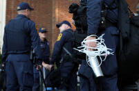 <p>Law enforcement arrives ahead of the one year anniversary of 2017 Charlottesville “Unite the Right” protests, in Charlottesville, Va., Aug. 10, 2018. (Photo: Jim Urquhart/Reuters) </p>