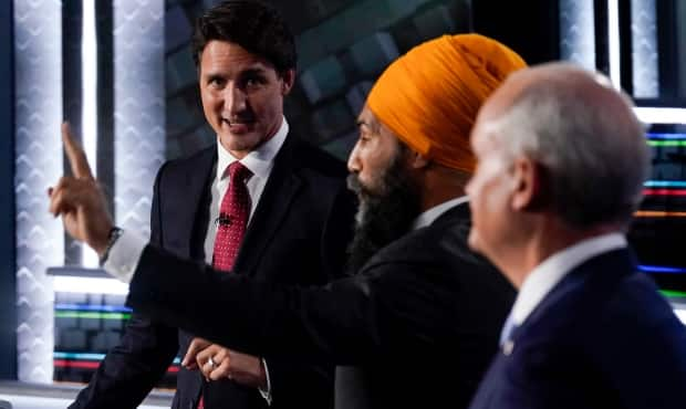 Left to right: Liberal Leader Justin Trudeau, NDP Leader Jagmeet Singh and Conservative Leader Erin O'Toole take part in the federal election English-language leaders debate in Gatineau, Que., on Thursday, Sept. 9, 2021. (Adrian Wyld/The Canadian Press - image credit)