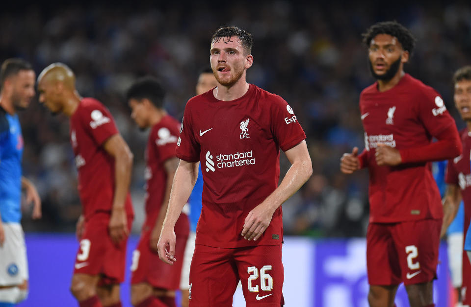 Andy Robertson (pictured) reacting during a Champions League match.