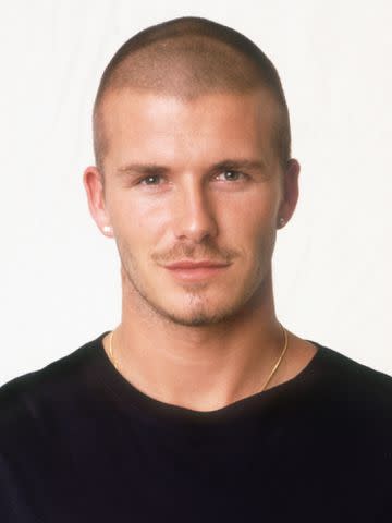 Dave Hogan/Hulton Archive/Getty David Beckham poses for a photo in 2000.