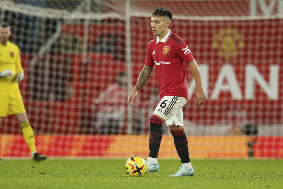 Manchester United's Lisandro Martinez controls the ball during the English Premier League soccer match between Manchester United and Bournemouth at Old Trafford in Manchester, England, Tuesday, Jan. 3, 2023. (AP Photo/Dave Thompson)