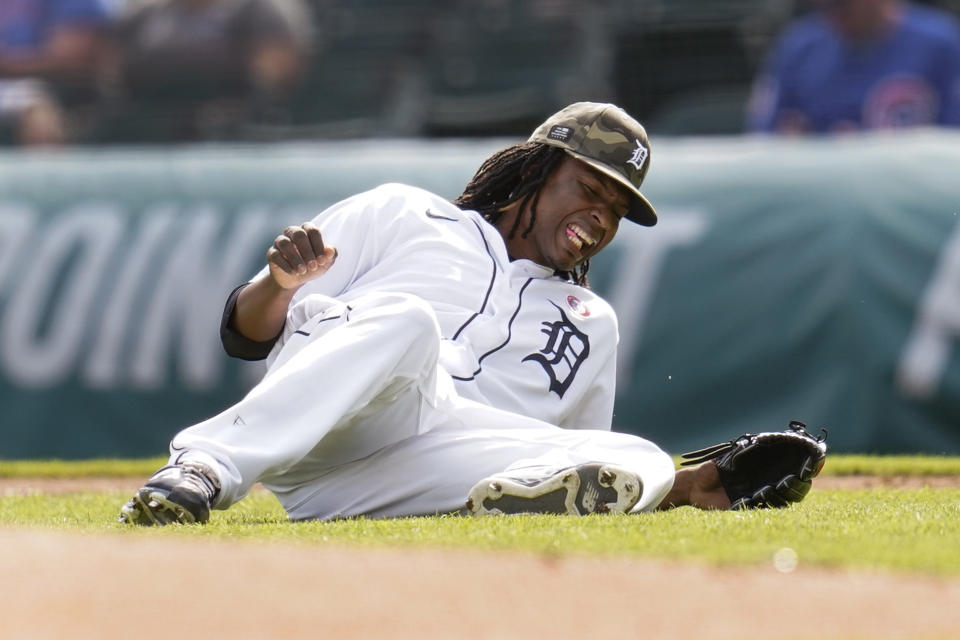 Detroit Tigers' pitcher Jose Urena grimaces after being hit by a Chicago Cubs' Jason Heyward line drive in the second inning of a baseball game in Detroit, Saturday, May 15, 2021. (AP Photo/Paul Sancya)