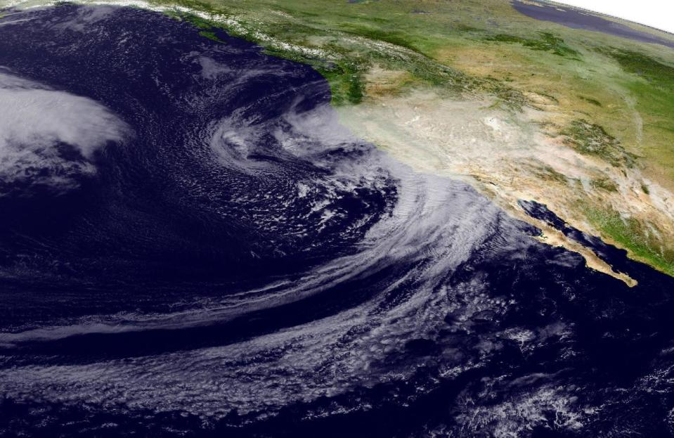 In this Friday, Feb. 17, 2017 satellite image released by the National Oceanic and Atmospheric Administration (NOAA) shows a powerful storm beginning to move into California as the saturated state faces a new round of wet weather that could trigger flooding and debris flows around the northern region. The brunt of the storm is expected to affect Southern California starting around midday Friday and into Saturday. Forecasters say rain will also spread into Central California and up to the San Francisco Bay Area. But the National Weather Service says only scattered light showers are occurring in the region north of Sacramento, where the damaged Oroville Dam continues to release water in advance of new storms. (National Oceanic and Atmospheric Administration via AP)