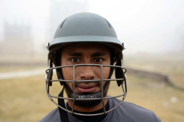 Former Bangladesh cricket captain Mohammad Ashraful poses for a photograph as he practices in Dhaka on November 18, 2015