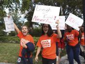 <p>Students from Miami County Day School walk out of their school to protest gun violence in Miami Shores, Fla., Wednesday, March 14, 2018. Students from all over the country rallied to continue to put pressure on state and federal lawmakers to enact gun control and school safety legislation. The day marks one month since a gunman killed 17 students and faculty at Marjory Stoneman Douglas High School in Parkland, Fla. (Photo: Marta Lavandier/AP) </p>