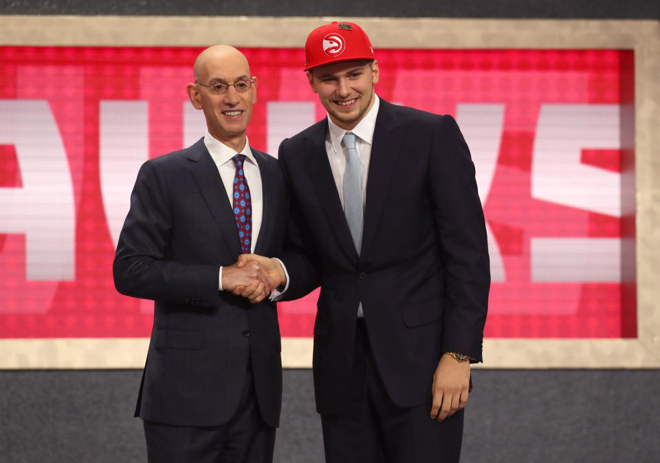 The Atlanta Hawks and Dallas Mavericks reached a deal in the NBA draft on Thursday night, trading the No. 3 and No. 5 picks to send Luka Doncic to the Mavericks. (Getty Images)Y