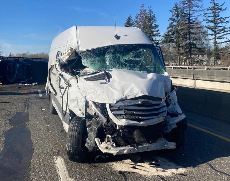 An image from the scene of a crash involving a car hauler and a van Tuesday, March 19, on I-5 near Ferndale, WA.