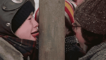 Flick's tongue stuck to a pole