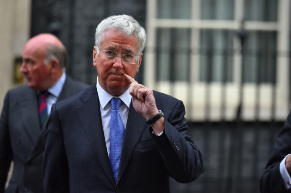 Michael Fallon addresses the media in Downing Street (PA)