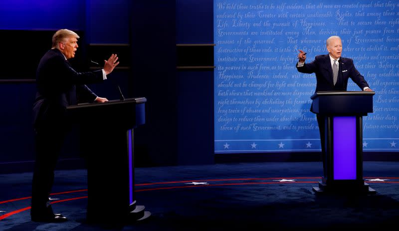 U.S. President Donald Trump and Democratic presidential nominee Joe Biden participate in their first 2020 presidential campaign debate in Cleveland, Ohio, U.S.