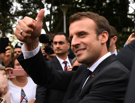 French President Emmanuel Macron gestures to onlookers after a Commemorative Service at the ANZAC war memorial in Sydney, May 2, 2018. AAP/David Moir/via REUTERS