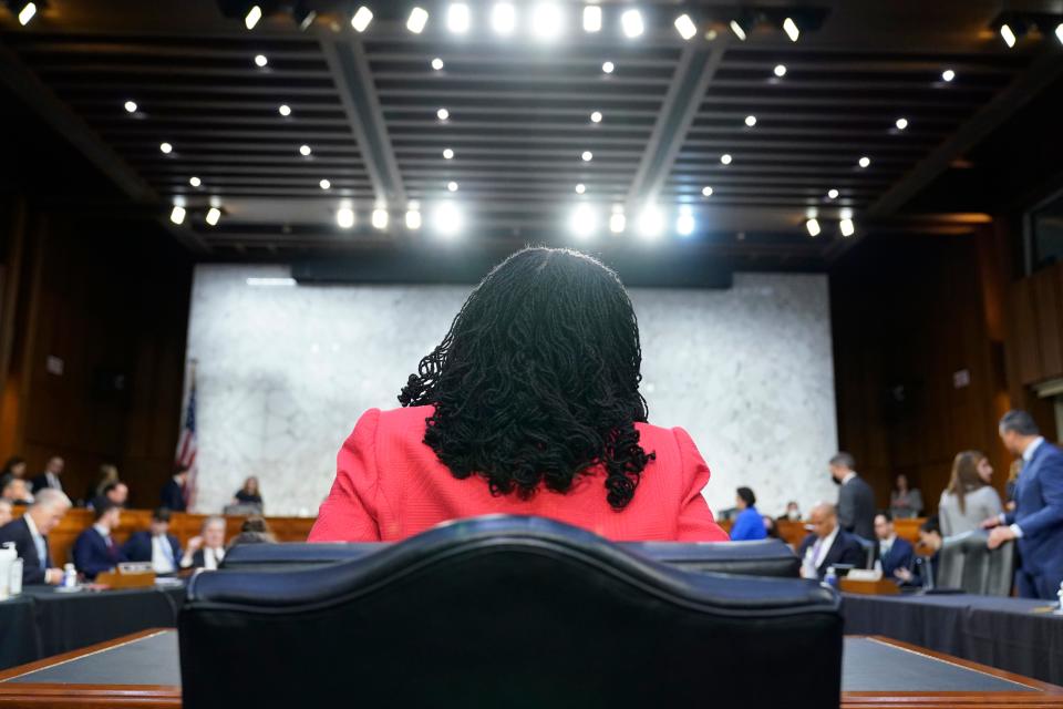 Supreme Court nominee Ketanji Brown Jackson arrives back to the witness chair as she testifies during her Senate Judiciary Committee confirmation hearing on Capitol Hill in Washington, Tuesday, March 22, 2022.