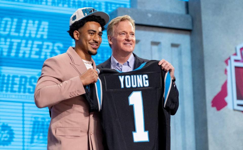 Alabama quarterback Bryce Young poses for photos with NFL Commissioner Roger Goodell after being picked first overall by the Carolina Panthers during the NFL Draft outside of Union Station on Thursday, April 27, 2023, in Kansas City. Nick Wagner/nwagner@kcstar.com